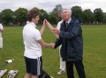 Percy Friebe presents trophy